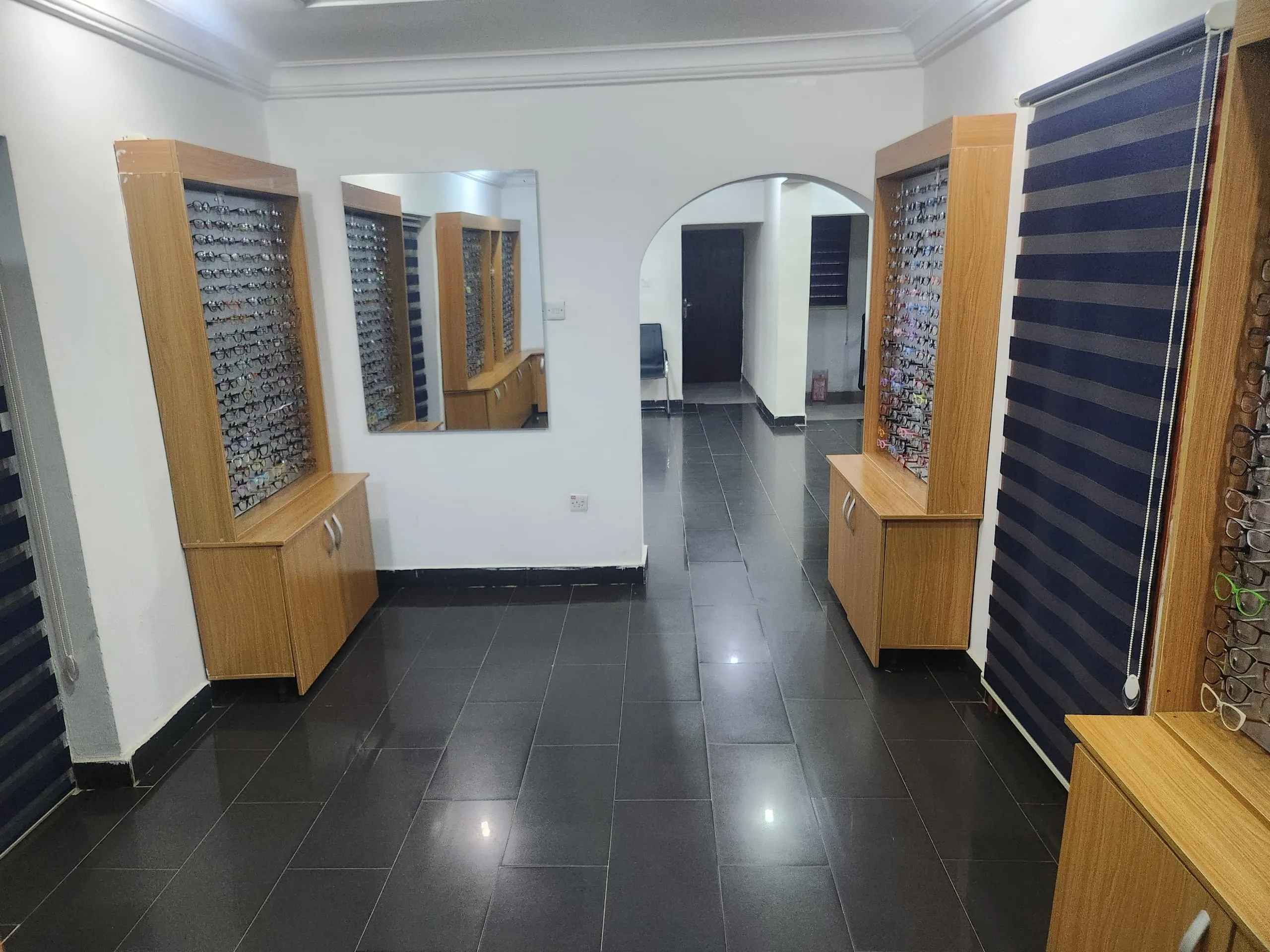 The eyewear display hallway at a Locus Eye Clinic location
